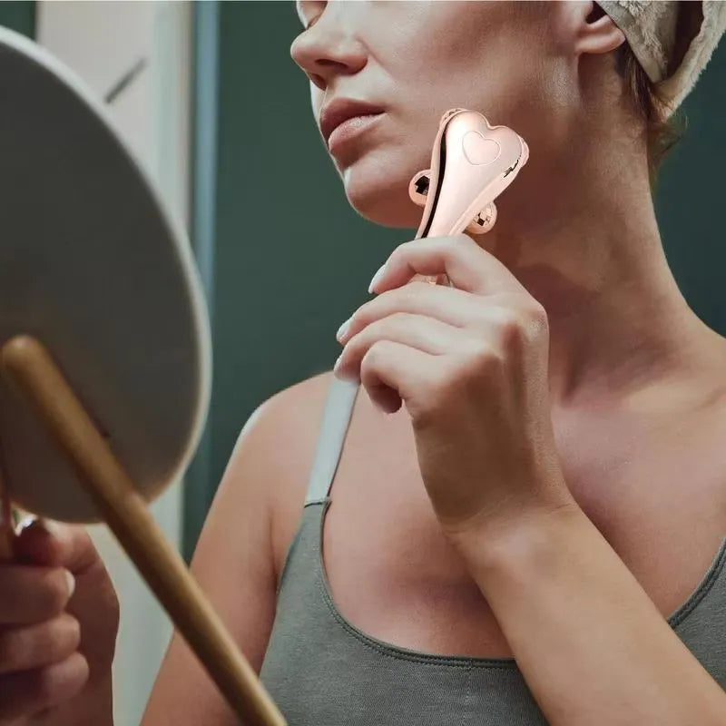3D face massager roller on jawline