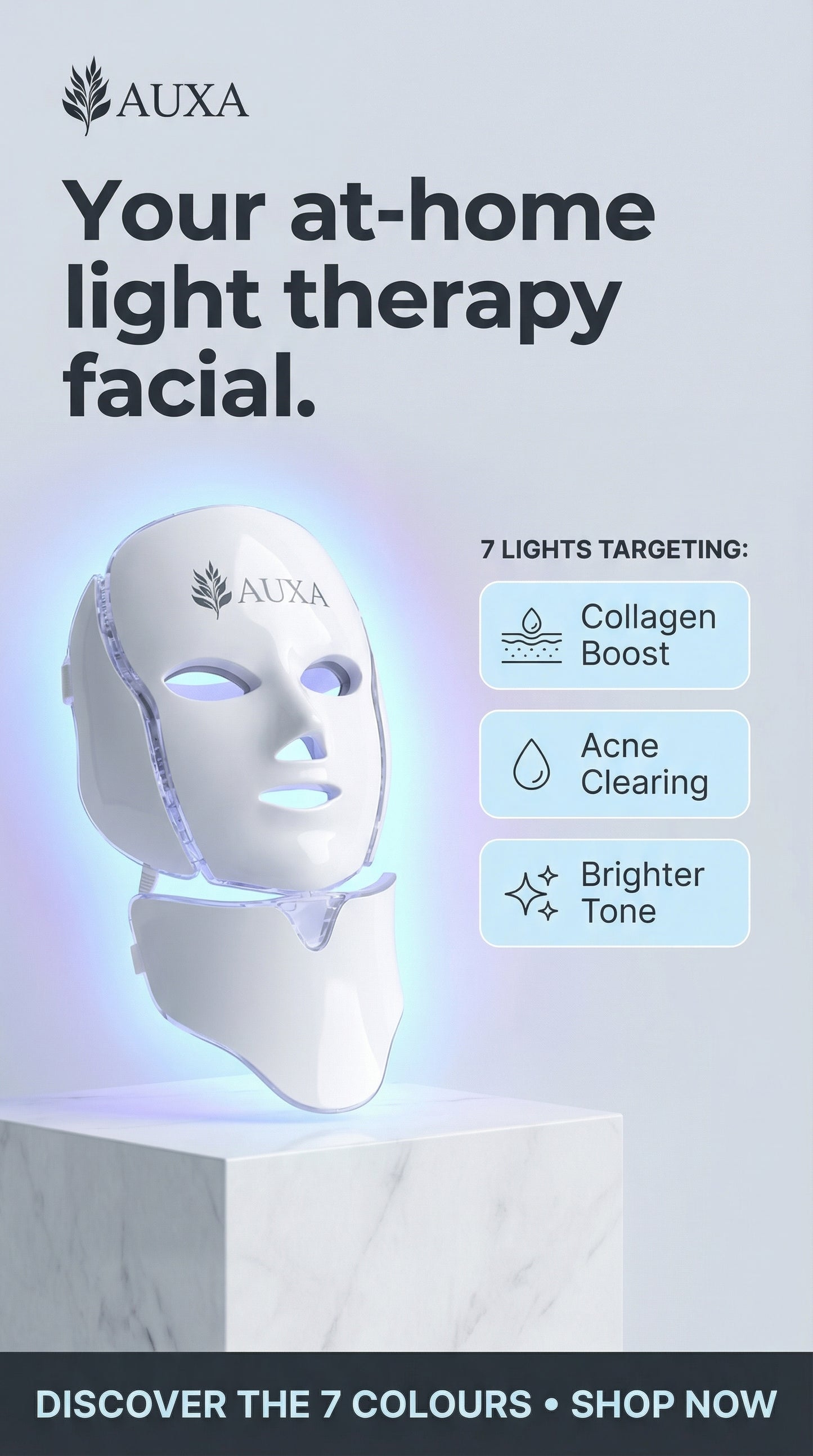 Auxa LED facial mask with light therapy features on a gray background